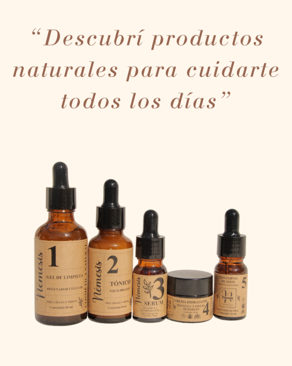 Goteros y frascos de la rutina facial de Némesis sobre fondo crema